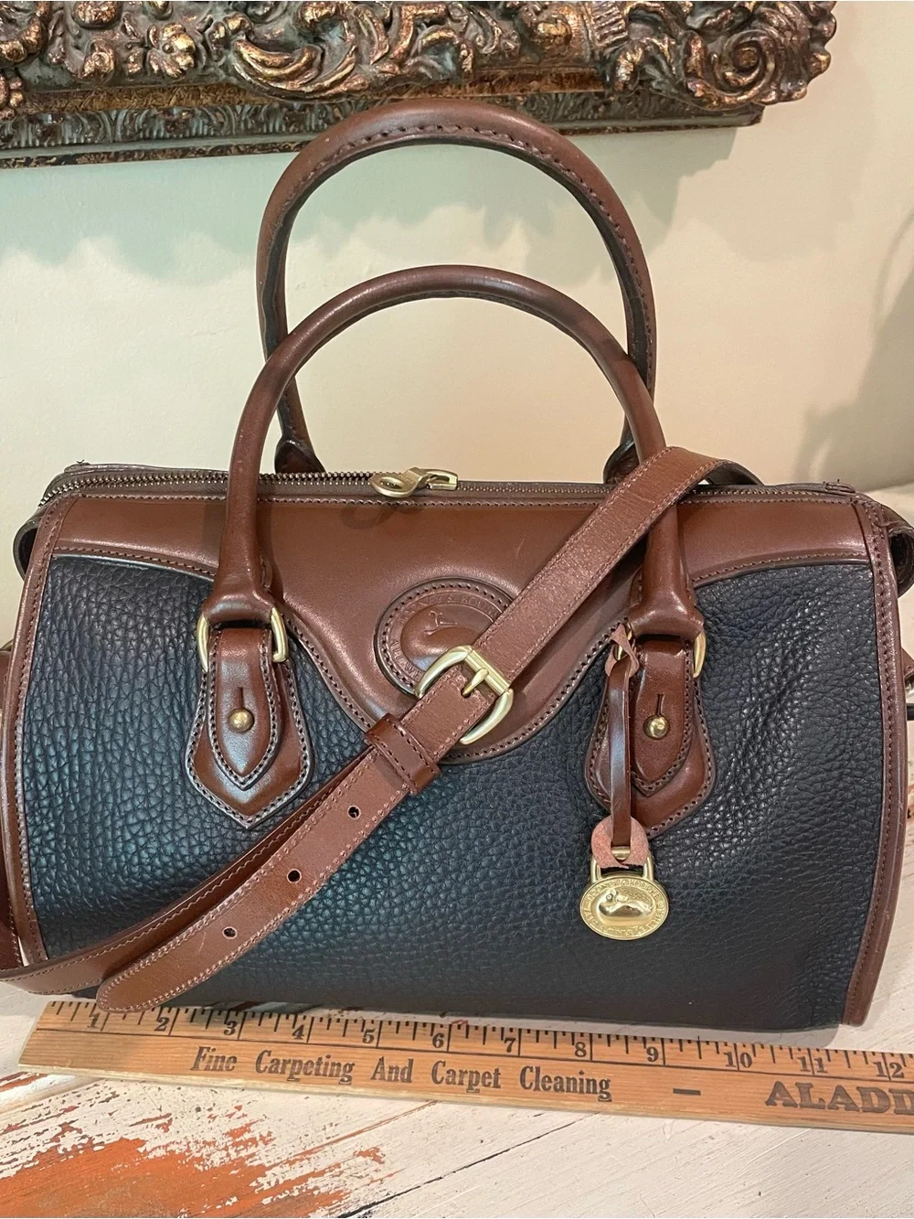 Dooney & Bourke vintage AWL Black and Brown Pebbled Leather Satchel / crossbody